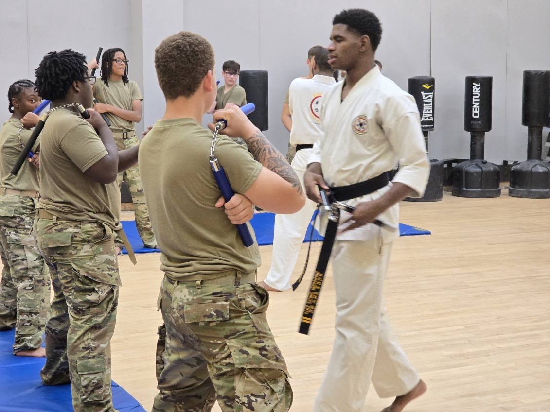 Cadets training with nunchaku during a weapons session.